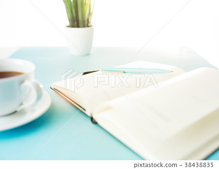 Books and pen on the blue table Books and pen on the blue table 38438835