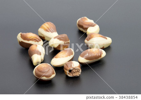 Chocolate candies isolated on black .background. Chocolate candies isolated on black .background. 38438854