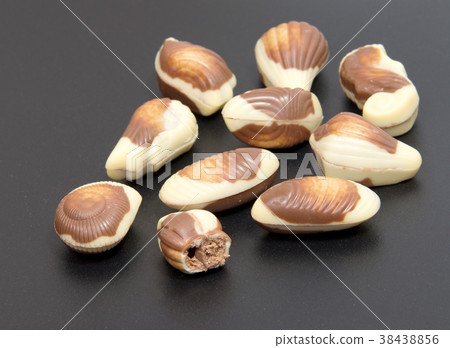 Chocolate candies isolated on black .background. Chocolate candies isolated on black .background. 38438856