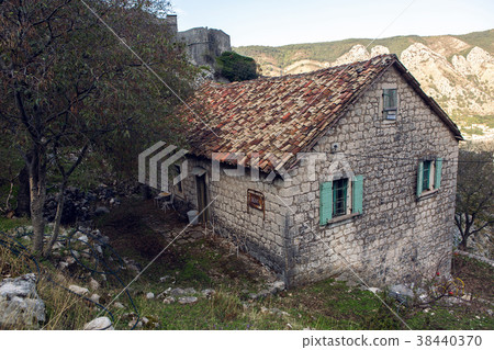 old stone house in the mountains 38440370