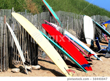 Surfboards resting up on a fence in Ditch Plains Surfboards resting up on a fence in Ditch Plains 38440847