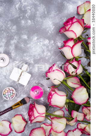 Bouquet of roses with cosmetics in perfume on a 38440880