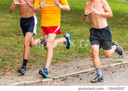Three teenage boys train for cross country running 38440897