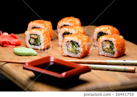 California roll sushi with shrimp and avocado. 38441750