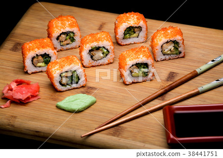 California roll sushi with shrimp and avocado. 38441751