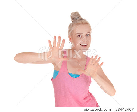 Beautiful blond woman pushing back 38442407