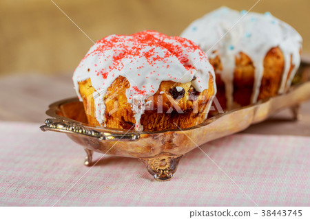 Sweet Easter bread on Easter background Sweet Easter bread on Easter background 38443745