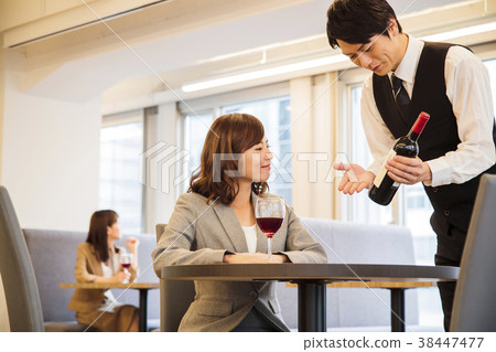 Little drink sommelier female businessman Little drink sommelier female businessman 38447477