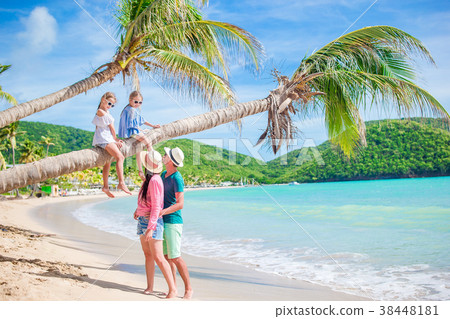 Happy family on beach vacation 38448181