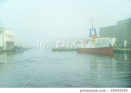 Fishing port of Ustka, Poland with morning fog Fishing port of Ustka, Poland with morning fog 38449385