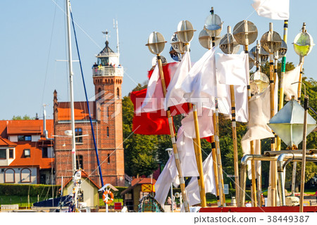 Fishing port of Ustka, Poland with old lighthouse Fishing port of Ustka, Poland with old lighthouse 38449387