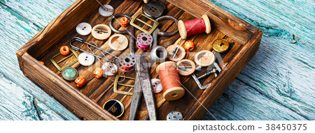 Sewing buttons and spools of thread Sewing buttons and spools of thread 38450375
