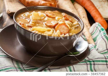 Traditional Polish split pea soup with sausage 38457362