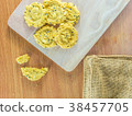 Oatmeal  cookies on wooden table. 38457705