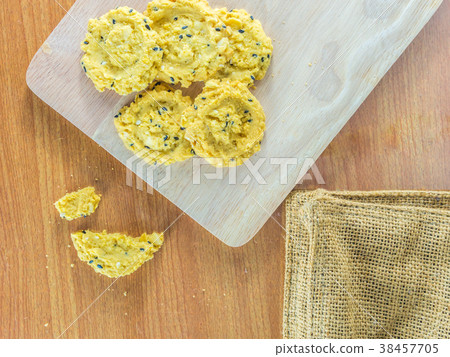 Oatmeal  cookies on wooden table. 38457705