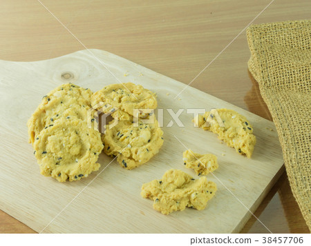 Oatmeal  cookies on wooden table. 38457706