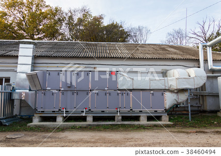 Side view of the gray industrial central 38460494