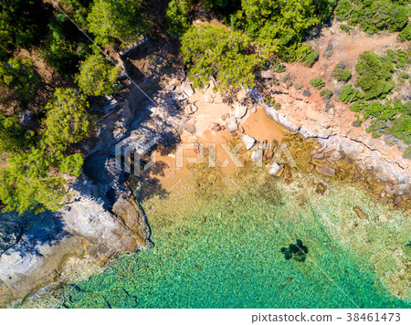 Aerial view of sandy beach with rocks and water Aerial view of sandy beach with rocks and water 38461473