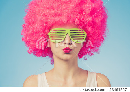 Portrait of beautiful party woman in pink wig 38461837