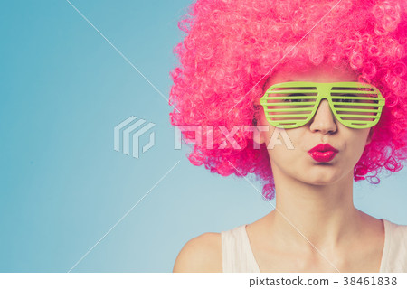 Portrait of beautiful party woman in pink wig 38461838