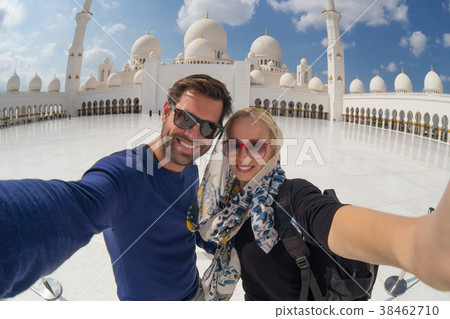 Couple taking selfie in Sheikh Zayed Grand Mosque 38462710