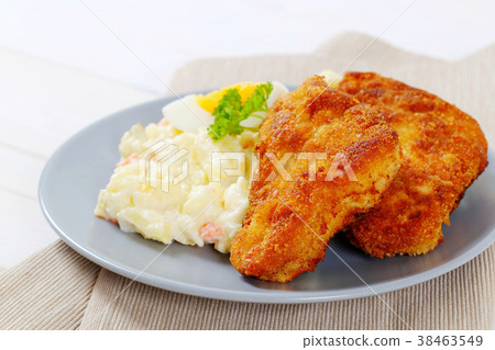 schnitzels with potato salad schnitzels with potato salad 38463549