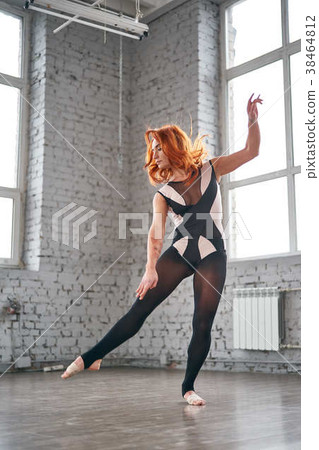 Woman dancer, in beautiful dynamic jump action 38464812