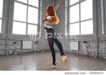 Woman dancer, in beautiful dynamic jump action Woman dancer, in beautiful dynamic jump action 38464814