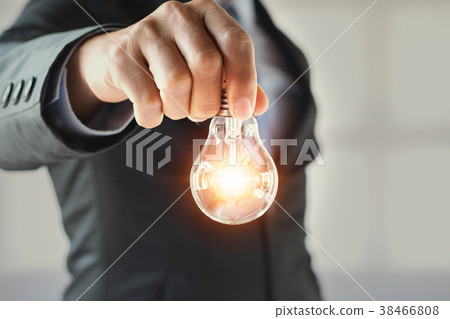 concept businessman holding lightbulb. idea concept businessman holding lightbulb. idea 38466808