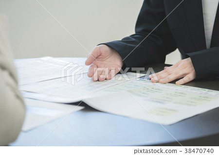 Female salesman and young female body parts parts cut faceless 38470740