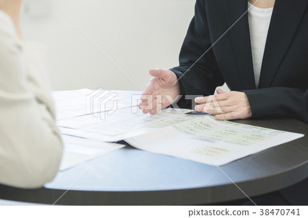 Female salesman and young female body parts parts cut faceless 38470741