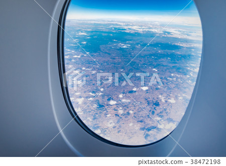 airplane window when flying see through at cloud airplane window when flying see through at cloud 38472198