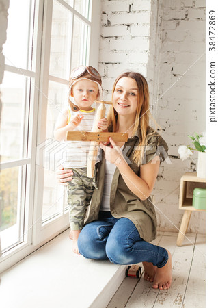 Cheerful Mom and her Son  38472869