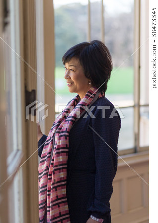A woman at the window 38473345