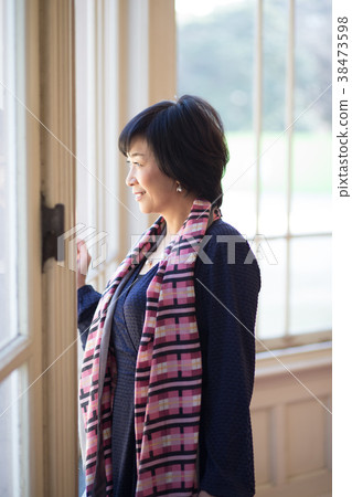 Woman at the window Woman at the window 38473598