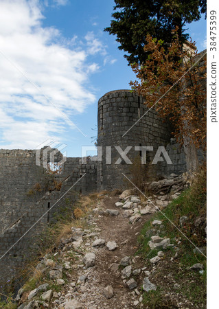 wall of an old stone fortress 38475399
