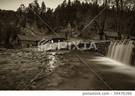 Old wooden water mill at National Nature Reserve 38476166