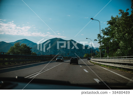 driving a car through Lobardy in Italy, Lake Iseo 38480489