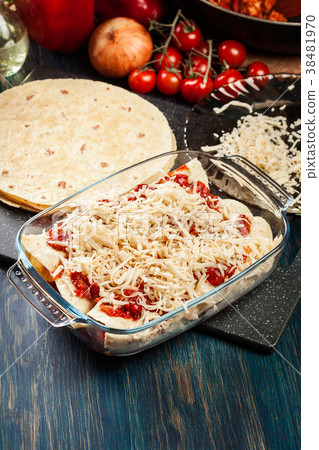 Traditional mexican enchiladas with chicken meat 38481970