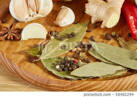 Conceptual composition of different spices and oil 38482294