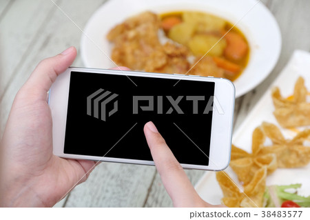 Hands using smart phone with blank screen Hands using smart phone with blank screen 38483577