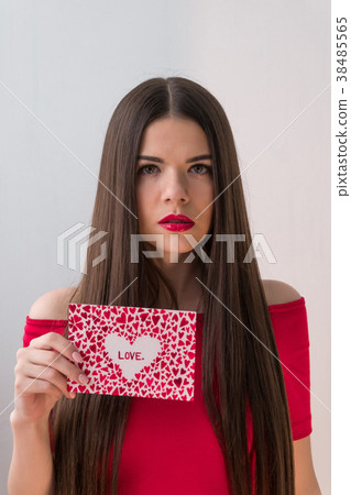 Portrait of a sweet perfect girl smiling at camera 38485565