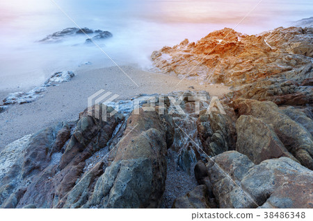 Seascape of rock in long exposure Seascape of rock in long exposure 38486348