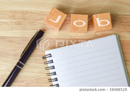 Inscription job on the wooden table. 38486529