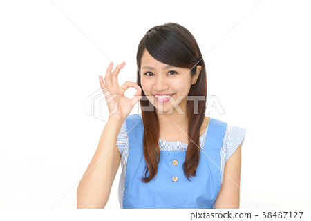 Smiling housewife Smiling housewife 38487127