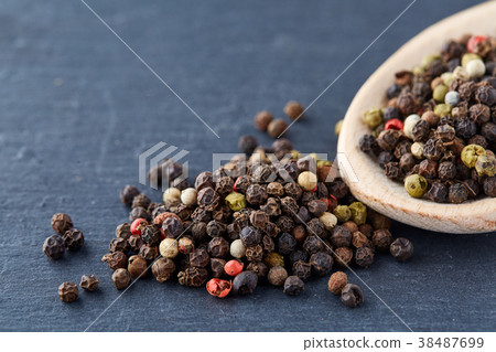 Top view on composition of peppercorns in wooden 38487699