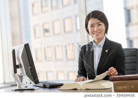 Female lawyer middle office image 38489456