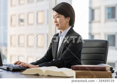 Female lawyer middle office image 38489539