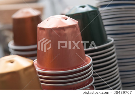 colorful metallic capsules of espresso coffee  38489707