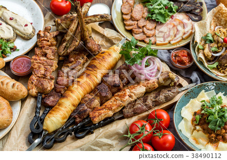 Outdoors Food Concept. Appetizing barbecued steak 38490112